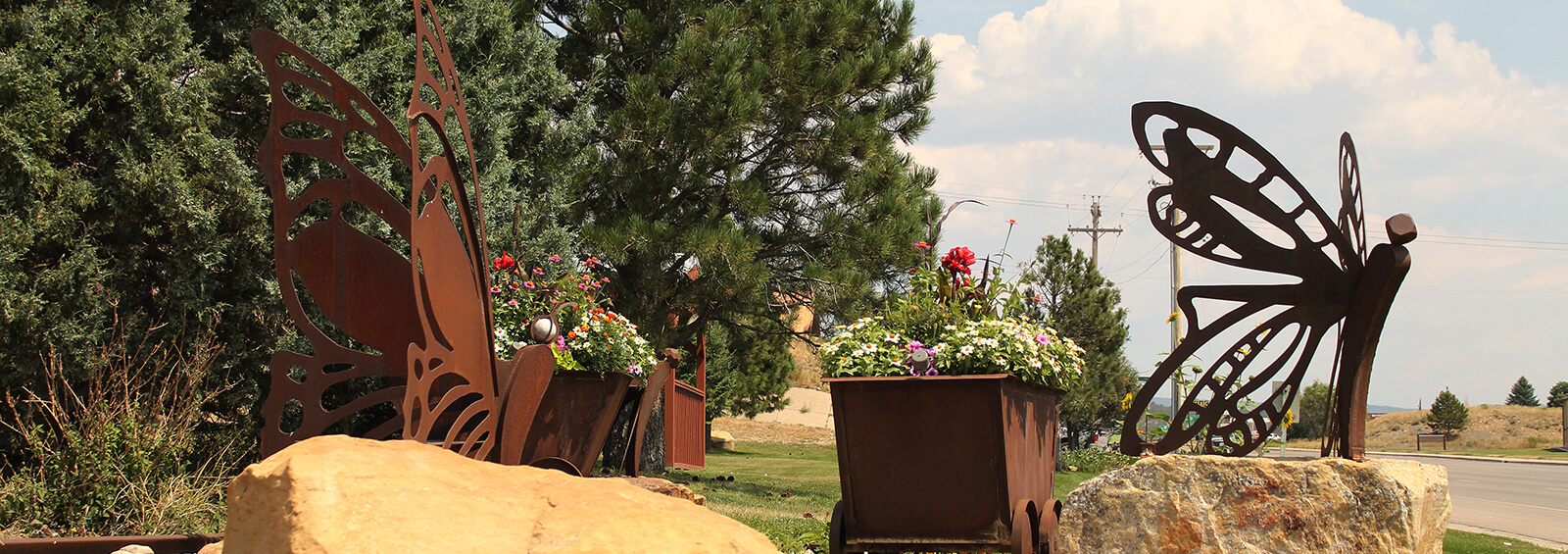 Local artwork and botanical efforts combine to beautify the Newcastle Main Street.